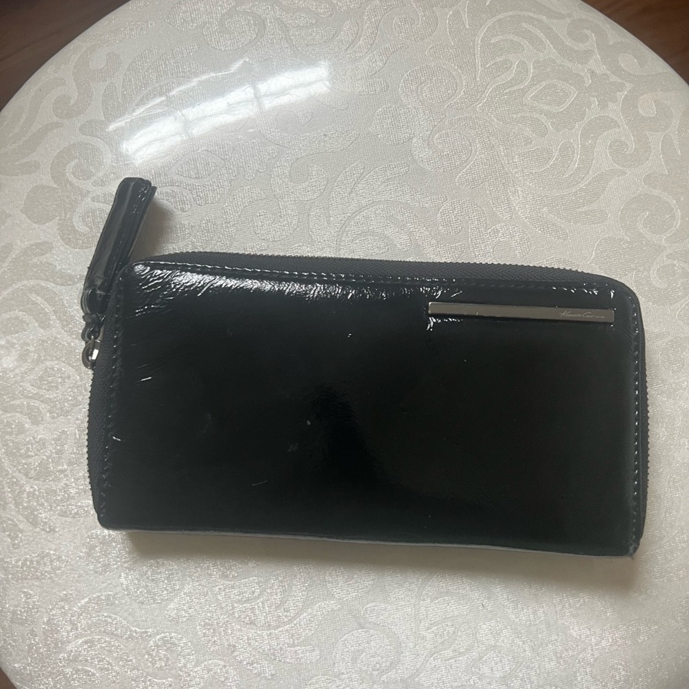 Item: faux leather zip up wallet